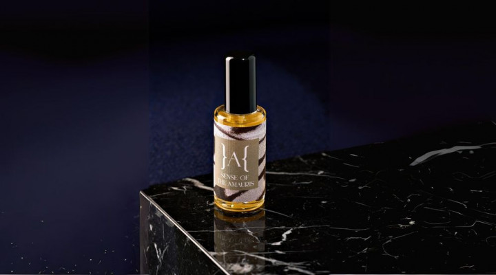 a bottle of liquid on a marble surface